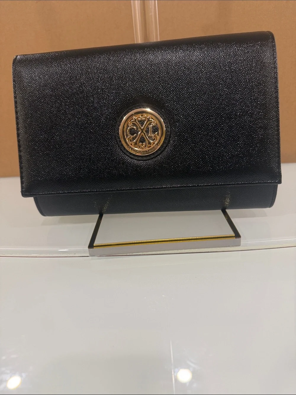Black Leather Crossbody Bag with Gold Logo Accent